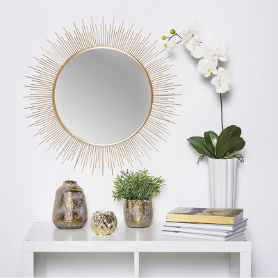 Espejo dorado con efecto sol para pared